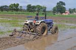 015.Tractor drawn puddling